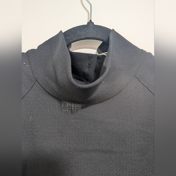 COS | Power-shoulder Open-back Waisted Wool Top In Black - Picture 10 of 15